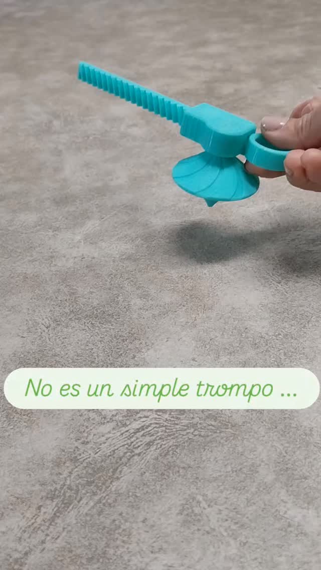 Juguete de motricidad y coordinación en color turquesa